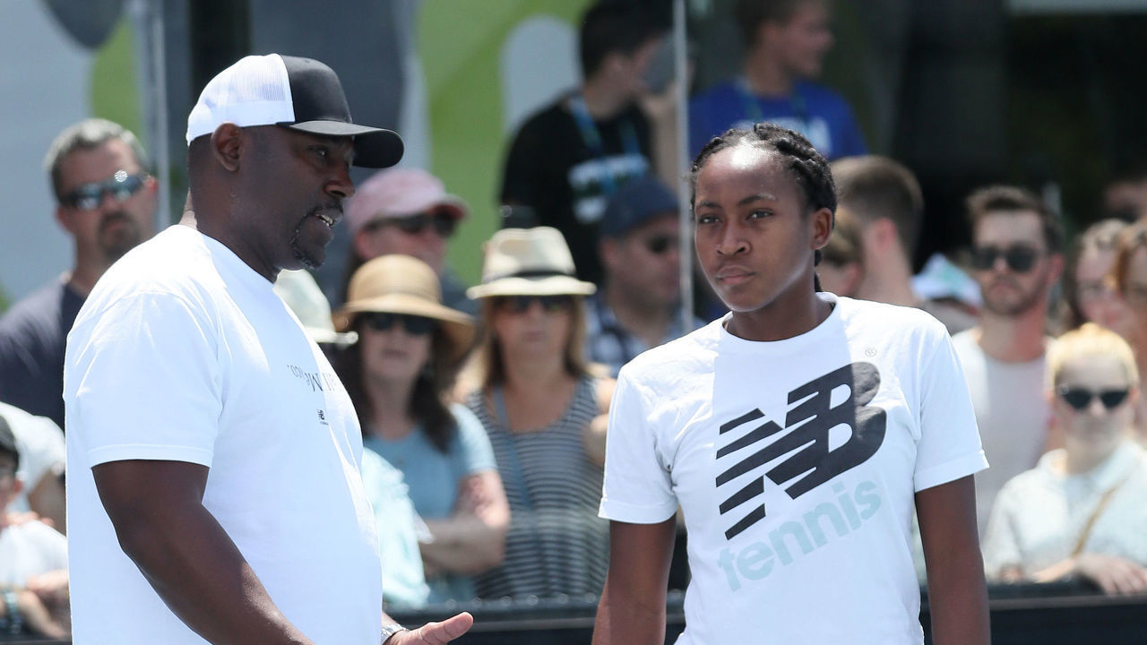 MELBOURNE, AUSTRALIA - JANUARY 26: Coco Gauff of the United States and her father Corey Gauff look on during a practice session on day seven of the 2020 Australian Open at Melbourne Park on January 26, 2020 in Melbourne, Australia.
