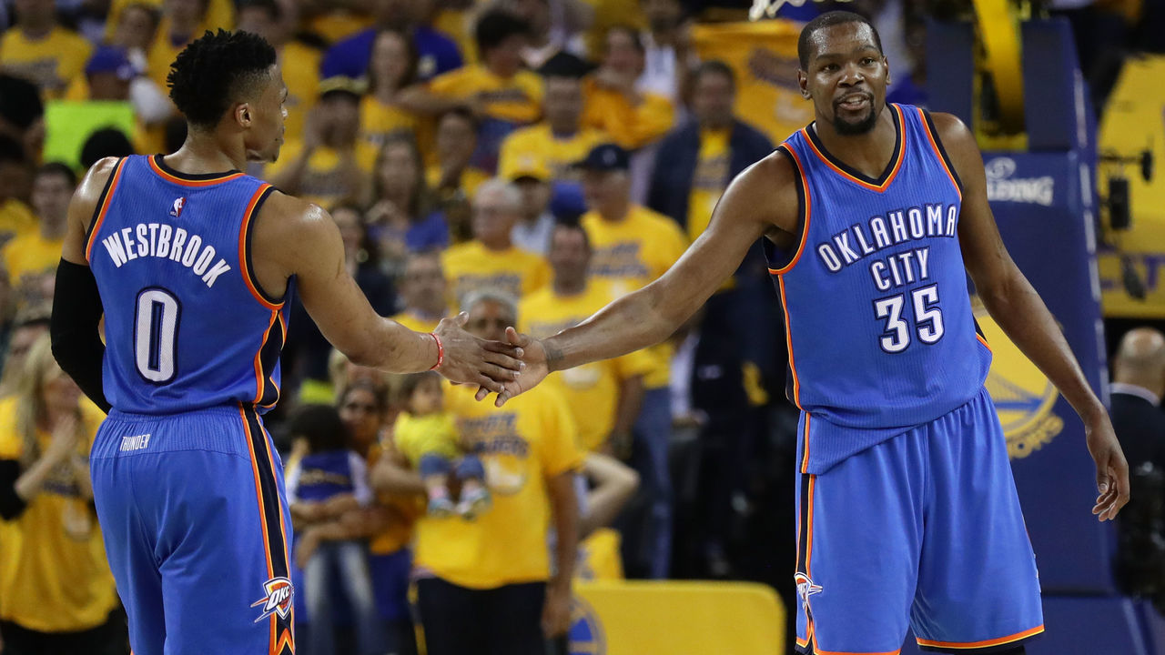 OAKLAND, CA - MAY 26: Russell Westbrook #0 and Kevin Durant #35 of the Oklahoma City Thunder celebrate after a play against the Golden State Warriors during Game Five of the Western Conference Finals during the 2016 NBA Playoffs at ORACLE Arena on May 26, 2016 in Oakland, California.