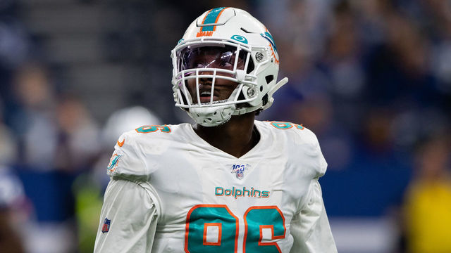 INDIANAPOLIS, IN - NOVEMBER 10: Miami Dolphins defensive end Taco Charlton (96) watches a replay on the video board during the NFL game between the Miami Dolphins and the Indianapolis Colts on November 10, 2019 at Lucas Oil Stadium, in Indianapolis, IN.