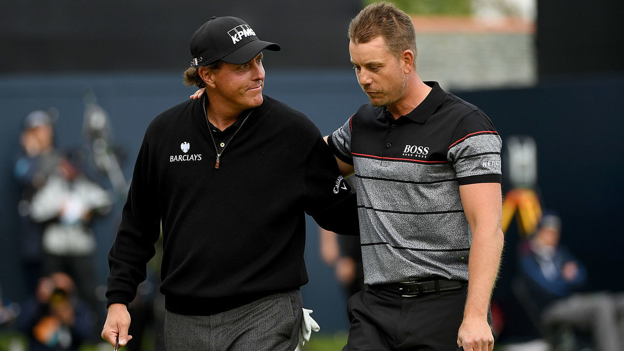 TROON, SCOTLAND - JULY 17: Henrik Stenson of Sweden is congratulated by Phil Mickelson of the United States (L) on the 18th green during the final round on day four of the 145th Open Championship at Royal Troon on July 17, 2016 in Troon, Scotland.