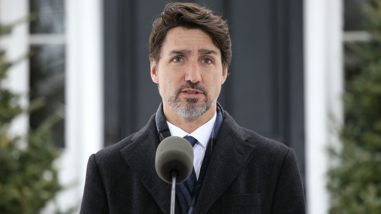 Canadian Prime Minister Justin Trudeau speaks during a news conference on COVID-19 situation in Canada from his residence March 17, 2020 in Ottawa, Canada. - Canada is closing its borders to most foreigners -- excluding Americans -- in a bid to stem the coronavirus pandemic, Prime Minister Justin Trudeau announced on March 16, 2020. "All Canadians, as much as possible, should also stay home," he told a news conference outside his home, where he and his family are self-isolating after his wife Sophie tested positive for COVID-19.