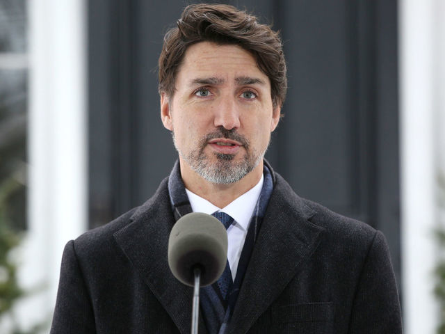 Canadian Prime Minister Justin Trudeau speaks during a news conference on COVID-19 situation in Canada from his residence March 17, 2020 in Ottawa, Canada. - Canada is closing its borders to most foreigners -- excluding Americans -- in a bid to stem the coronavirus pandemic, Prime Minister Justin Trudeau announced on March 16, 2020. "All Canadians, as much as possible, should also stay home," he told a news conference outside his home, where he and his family are self-isolating after his wife Sophie tested positive for COVID-19.
