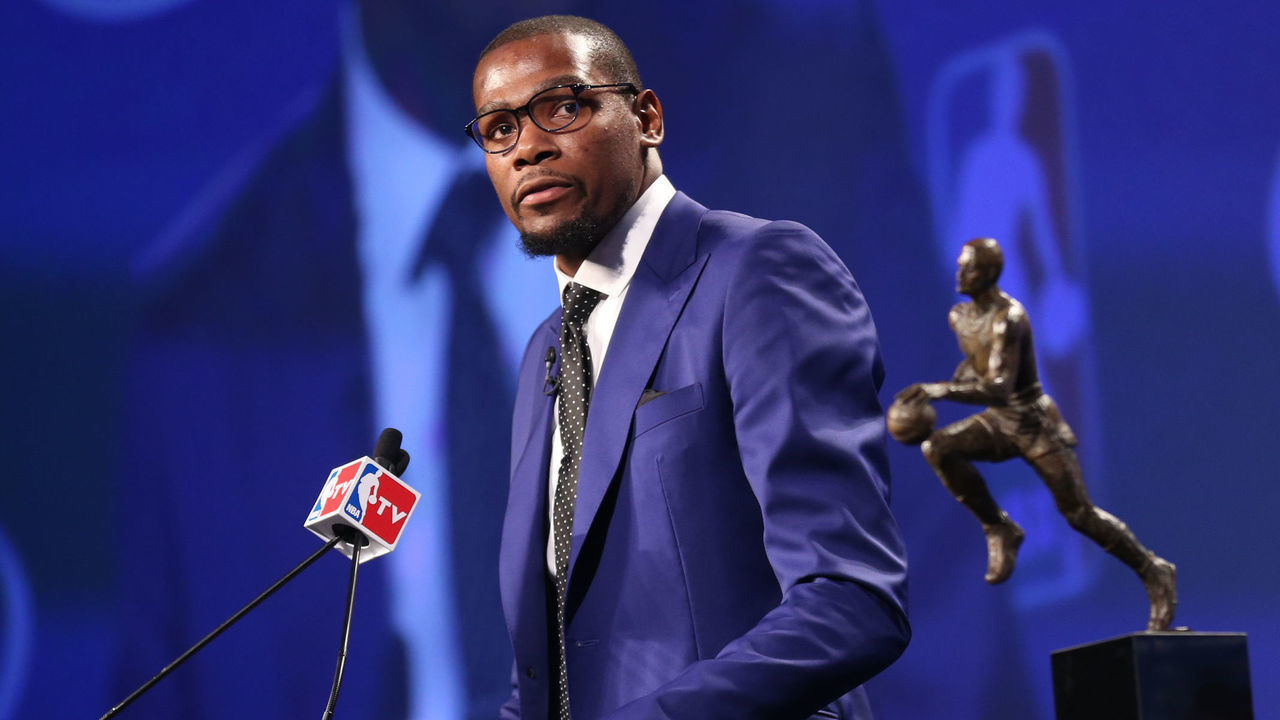 EDMOND, OK - MAY 06: Kevin Durant of the Oklahoma City Thunder speaks to the media after receiving the Maurice Podoloff Trophy at the 2013-14 KIA Player of the Year award during a press conference on May 6, 2014 at the Thunder Events Center in Edmond, Oklahoma. Mandatory Copyright Notice: Copyright 2014 NBAE