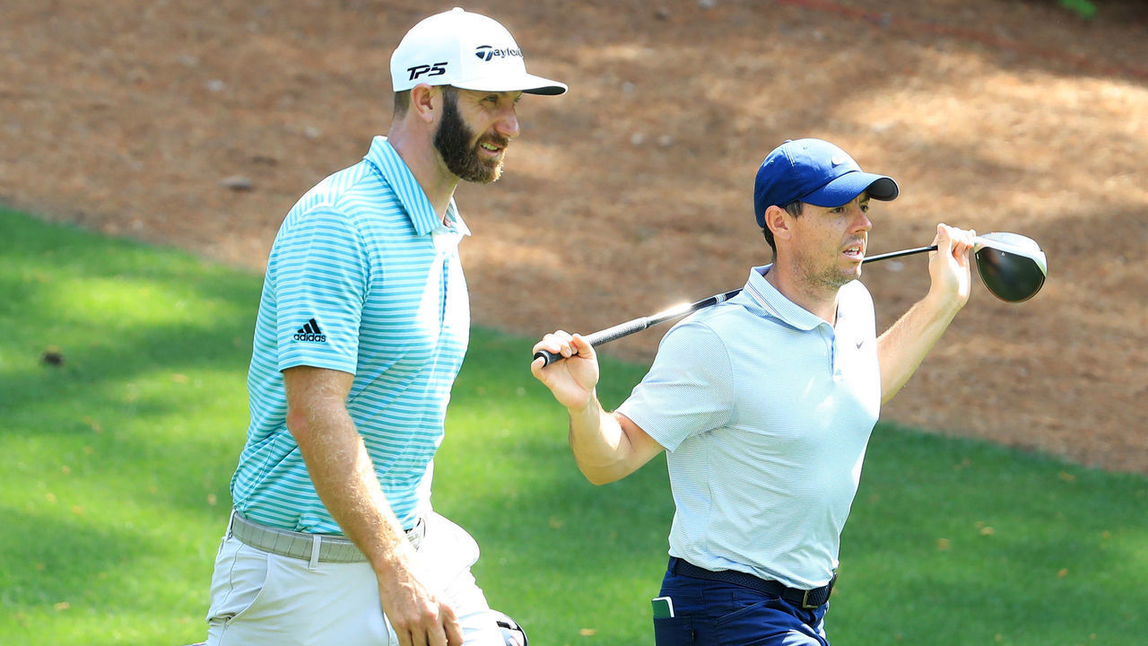 AUGUSTA, GEORGIA - APRIL 08: Rory McIlroy (R) of Northern Ireland and Dustin Johnson of the United States walk during a practice round prior to The Masters at Augusta National Golf Club on April 08, 2019 in Augusta, Georgia.