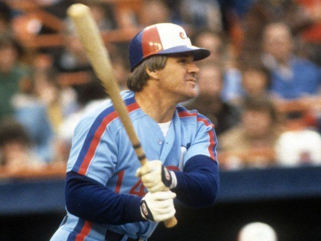 FLUSHING, NY - APRIL, 1984: Pete Rose #14 of the Montreal Expos swings at a pitch during an MLB game against the New York Mets in April, 1984 at Shea Stadium in Flushing, New York.