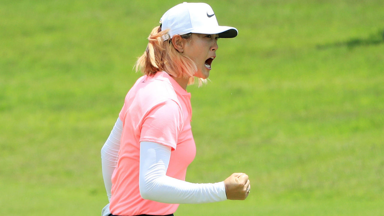 SINGAPORE - MARCH 04: Michelle Wie of the United States celebrates her birdie on the 18th green on her way to winning during the final round of the HSBC Women's World Championship at Sentosa Golf Club on March 4, 2018 in Singapore.