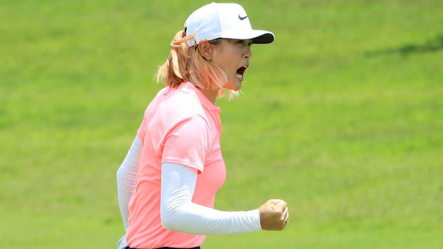 SINGAPORE - MARCH 04: Michelle Wie of the United States celebrates her birdie on the 18th green on her way to winning during the final round of the HSBC Women's World Championship at Sentosa Golf Club on March 4, 2018 in Singapore.