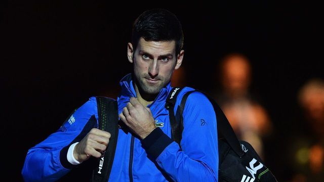 Serbia's Novak Djokovic arrives for his match against Austria's Dominic Thiem before their men's singles round-robin match on day three of the ATP World Tour Finals tennis tournament at the O2 Arena in London on November 12, 2019.