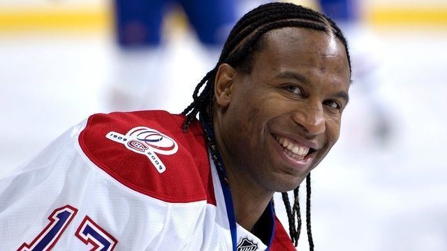 EDMONTON, AB - OCTOBER 10: Georges Laraque #17 of the Montreal Canadiens laughs with former teammates before a game against the Edmonton Oilers on October 10, 2009 at Rexall Place in Edmonton, Alberta, Canada. The Oilers beat the Canadiens 3-2.