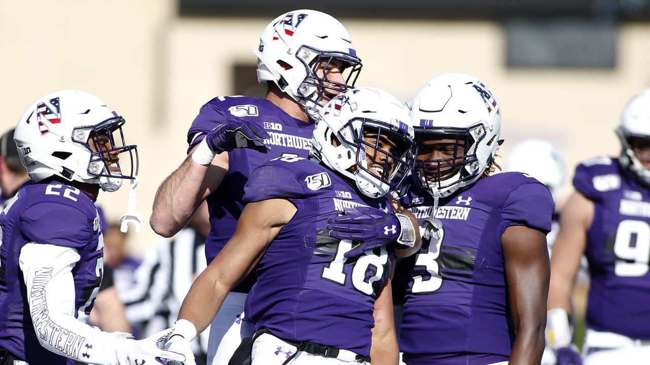 EVANSTON, ILLINOIS - NOVEMBER 09: Genson Hooper Price #18 of the Northwestern Wildcats celebrates after a play in the game against the Purdue Boilermakers at Ryan Field on November 09, 2019 in Evanston, Illinois.