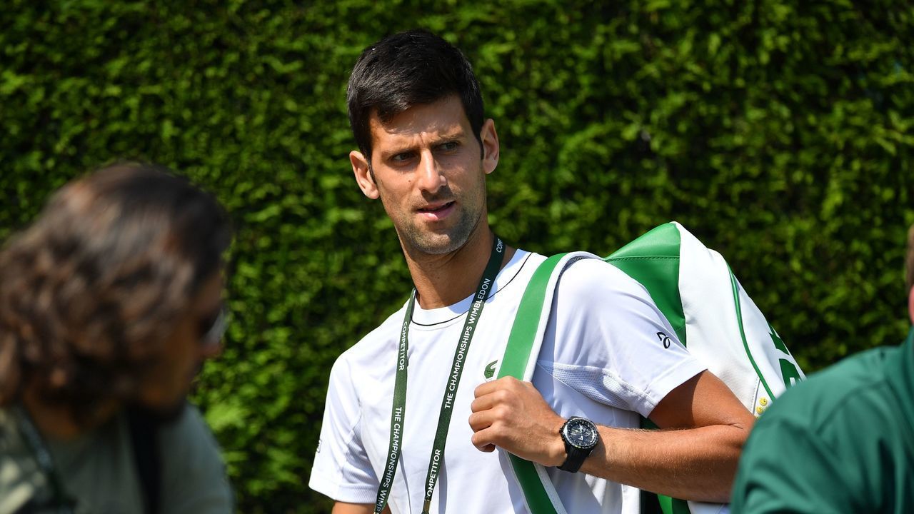 Serbia's Novak Djokovic arrives at the training courts at The All England Tennis Club in Wimbledon, southwest London, on July 1, 2018, on the eve of the 2018 Wimbledon Championships tennis tournament.