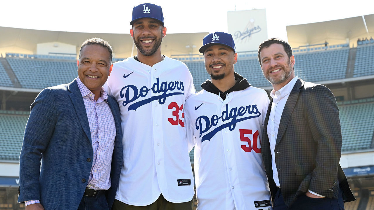 LOS ANGELES, CA - FEBRUARY 12: Manager Dave Roberts newly acquired Los Angeles Dodgers David Price #33 fand Mookie Betts #50 and general manager Andrew Friedman pose for a photo during the introductory press conference at Dodger Stadium on February 12, 2020 in Los Angeles, California.
