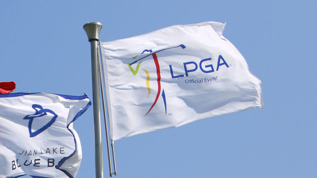 HAINAN ISLAND, CHINA - OCTOBER 30: Flag of LPGA and Chinese national flag fly on Day 5 of Blue Bay LPGA 2015 at Jian Lake Blue Bay golf course on October 30, 2015 in Hainan Island, China.