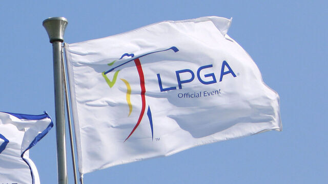 HAINAN ISLAND, CHINA - OCTOBER 30: Flag of LPGA and Chinese national flag fly on Day 5 of Blue Bay LPGA 2015 at Jian Lake Blue Bay golf course on October 30, 2015 in Hainan Island, China.