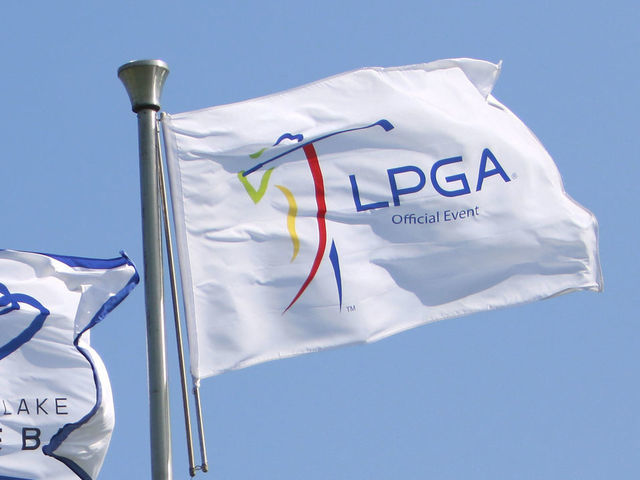 HAINAN ISLAND, CHINA - OCTOBER 30: Flag of LPGA and Chinese national flag fly on Day 5 of Blue Bay LPGA 2015 at Jian Lake Blue Bay golf course on October 30, 2015 in Hainan Island, China.
