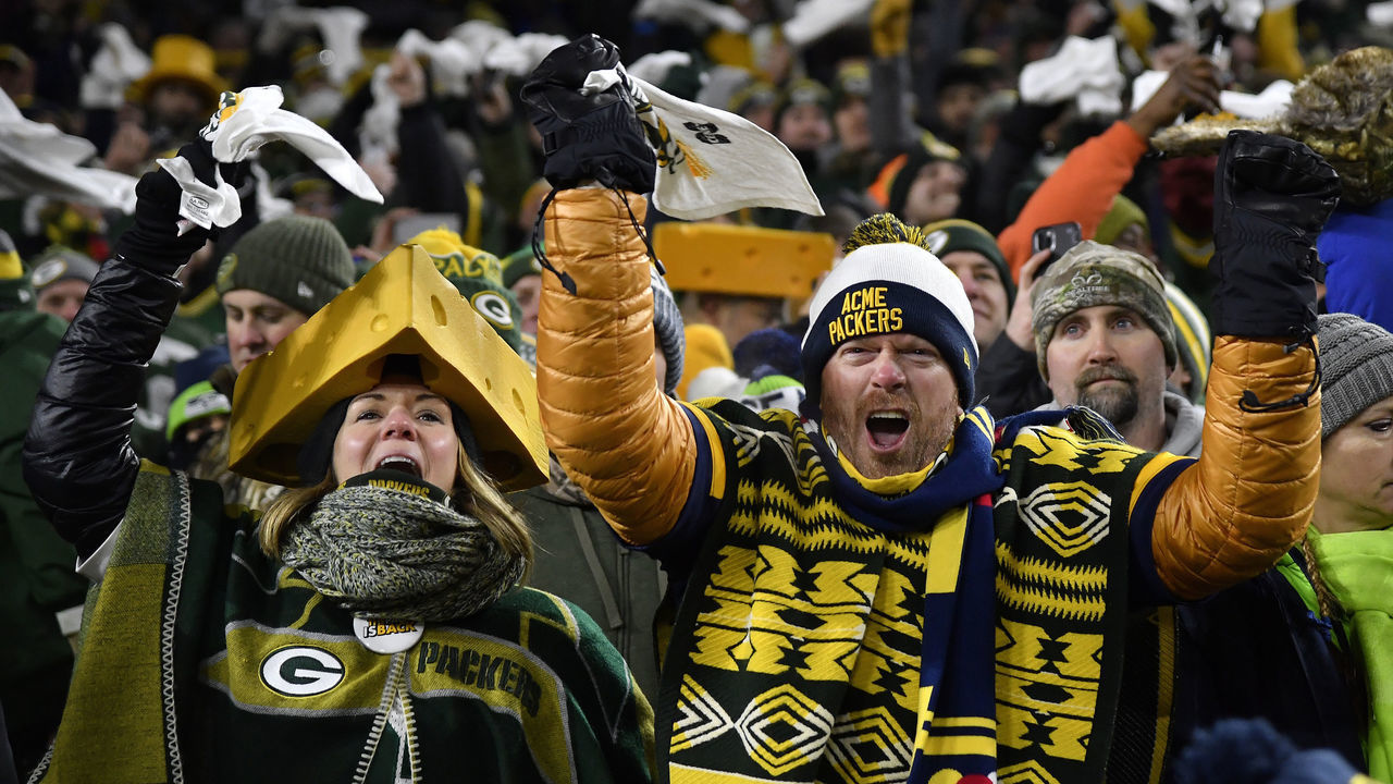 GREEN BAY, WISCONSIN - JANUARY 12: Fans of the Green Bay Packers cheers as they take on the Seattle Seahawks in the first half of the NFC Divisional Playoff game at Lambeau Field on January 12, 2020 in Green Bay, Wisconsin.