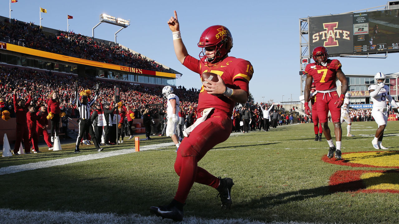 AMES, IA - NOVEMBER 23: Quarterback Brock Purdy #15 of the Iowa State Cyclones celebrates after scoring a touchdown as teammate wide receiver La'Michael Pettway #7 of the Iowa State Cyclones watches on in the second half of play at Jack Trice Stadium on November 23, 2019 in Ames, Iowa. The Iowa State Cyclones won 41-31 over the Kansas Jayhawks.