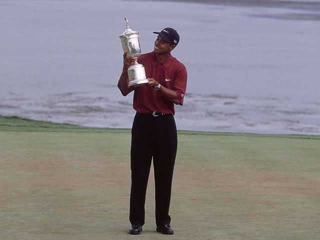18 Jun 2000: Tiger Woods of the USA poses with the winning trophy after winning the 100th US Open held at the Pebble Beach Golf Links, in Pebble Beach, California. \ Mandatory Credit: David Cannon /Allsport