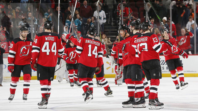 NEWARK, NJ - FEBRUARY 20: The New Jersey Devils salute their fans after their win over the San Jose Sharks during the game at the Prudential Center on February 20, 2020 in Newark, New Jersey. The Devils defeated the Sharks 2-1.