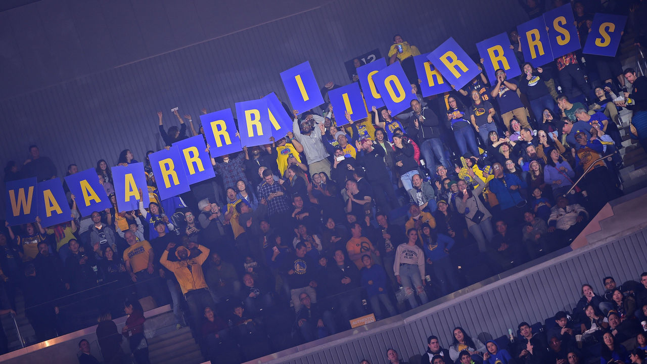 SAN FRANCISCO, CA - DECEMBER 27: Fans hold up signs during the game between the Phoenix Suns and the Golden State Warriors on December 27, 2019 at Chase Center in San Francisco, California. NOTE TO USER: User expressly acknowledges and agrees that, by downloading and or using this photograph, user is consenting to the terms and conditions of Getty Images License Agreement. Mandatory Copyright Notice: Copyright 2019 NBAE
