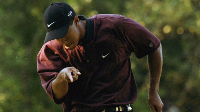 376403 05: Tiger Woods reacts after making a putt on the first hole of the playoff August 20, 2000 during the PGA Championship at the Valhalla Golf Club in Louisville, Ky. Woods defeated Bob May in the playoff to win the tournament, becoming the first player since Ben Hogan in 1953 to win three majors in one year.