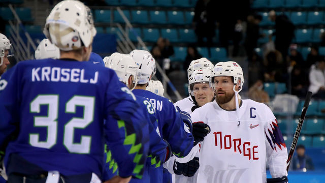 GANGNEUNG, SOUTH KOREA - FEBRUARY 20: Jonas Holos #6 of Norway shakes hands with Team Slovenia after the Men's Play-offs Qualifications game on day eleven of the PyeongChang 2018 Winter Olympic Games at Gangneung Hockey Centre on February 20, 2018 in Gangneung, South Korea.