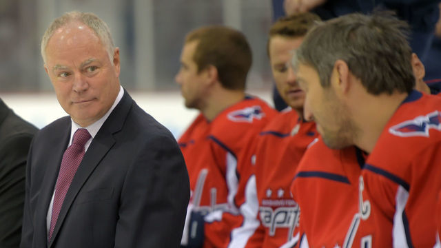 ARLINGTON, VA - APRIL 3: Washington Capitals GM Brian MacLellan ,left, talks to Alex Ovechkin,, right, during a team photo shoot at their practice facility in Arlington, VA on April 3, 2019 .