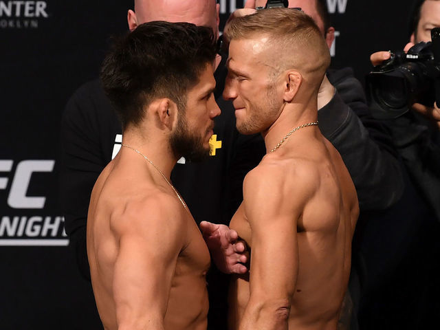 BROOKLYN, NEW YORK - JANUARY 18: (L-R) Henry Cejudo and TJ Dillashaw face off during the UFC Fight Night weigh-in iat Barclays Center on January 18, 2019 in the Brooklyn borough of New York City.