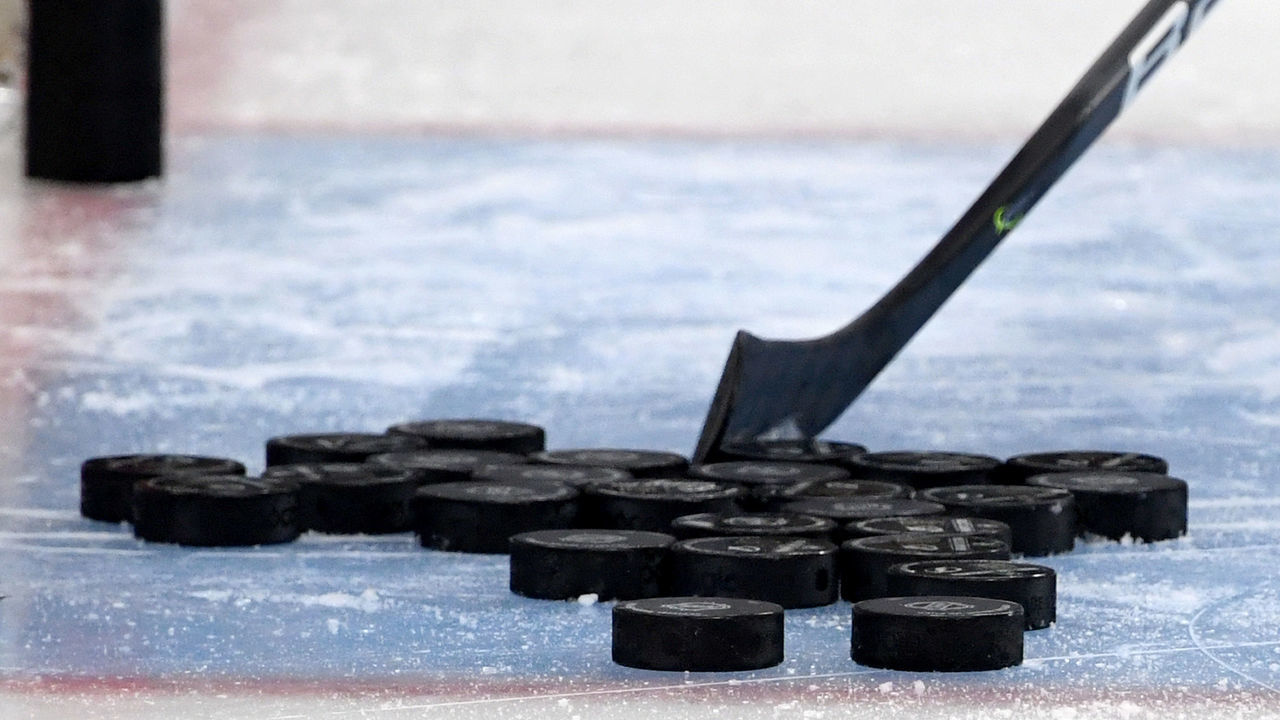 LAS VEGAS, NEVADA - FEBRUARY 20: Hockey pucks are gathered in the crease during warmups before a game between the Tampa Bay Lightning and the Vegas Golden Knights at T-Mobile Arena on February 20, 2020 in Las Vegas, Nevada. The Golden Knights defeated the Lightning 5-3.
