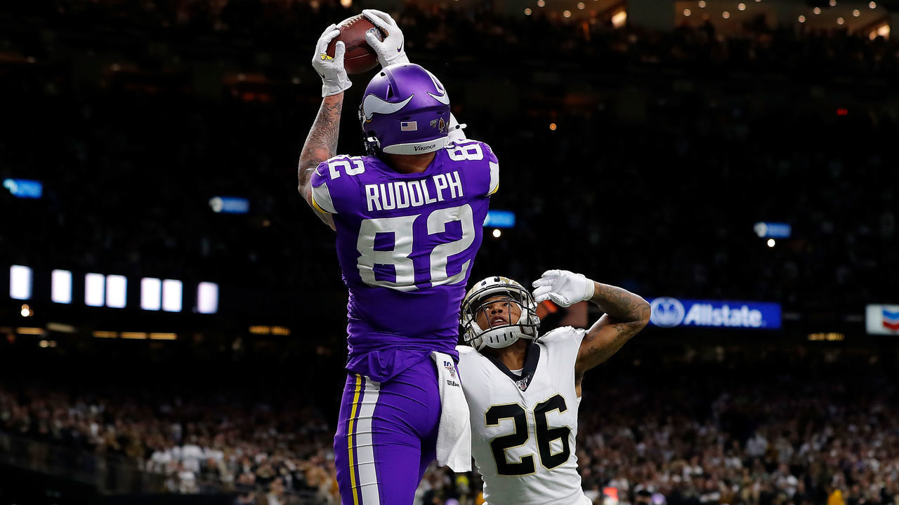 NEW ORLEANS, LOUISIANA - JANUARY 05: Kyle Rudolph #82 of the Minnesota Vikings makes the game-winning touchdown reception against P.J. Williams #26 of the New Orleans Saints during overtime in the NFC Wild Card Playoff game at Mercedes Benz Superdome on January 05, 2020 in New Orleans, Louisiana.