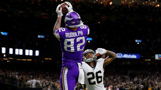 NEW ORLEANS, LOUISIANA - JANUARY 05: Kyle Rudolph #82 of the Minnesota Vikings makes the game-winning touchdown reception against P.J. Williams #26 of the New Orleans Saints during overtime in the NFC Wild Card Playoff game at Mercedes Benz Superdome on January 05, 2020 in New Orleans, Louisiana.