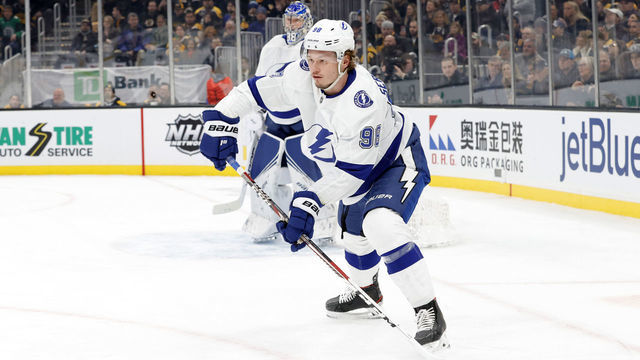 BOSTON, MA - MARCH 07: Tampa Bay Lightning defenseman Mikhail Sergachev (98) looks to clear the puck during a game between the Boston Bruins and the Tampa Bay Lightning on March 7, 2020 at TD Garden in Boston,. Massachusetts.