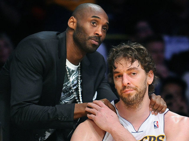 Lakers Kobe Bryant consoles Pau Gasol late in the 4th quarter against the Spurs in Game 4 of the NBA Playoffs at the Staples Center Sunday.