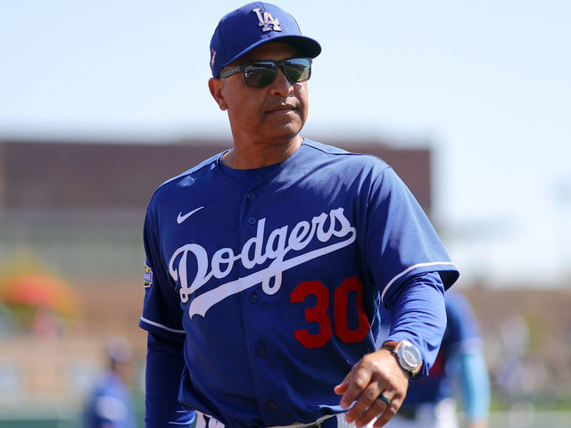 Los Angeles Dodgers manager Dave Roberts (30) looks on before the first  inning of a baseball