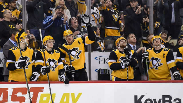 PITTSBURGH, PA - MARCH 12: Pittsburgh Penguins Center Evgeni Malkin (71) waves to the crowd after getting his 1,000th NHL career point during the third period in the NHL game between the Pittsburgh Penguins and the Washington Capitals on March 12, 2019, at PPG Paints Arena in Pittsburgh, PA.