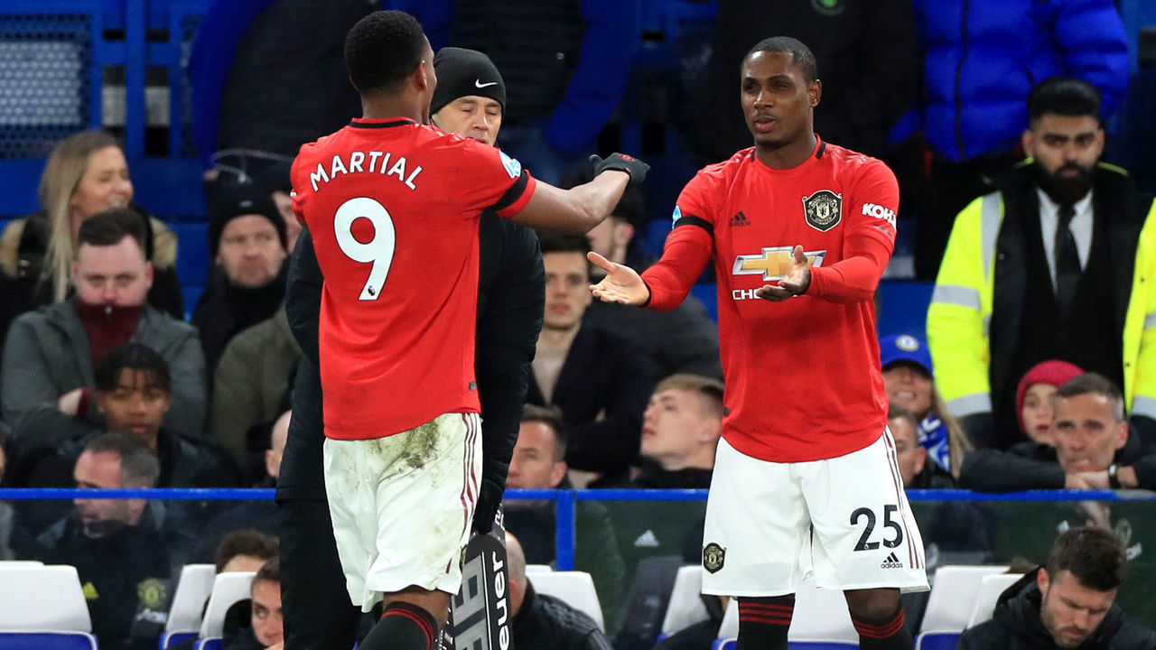 Manchester United's Odion Ighalo (right) makes his debut as he comes on as a substitute for team mate Anthony Martial during the Premier League match at Stamford Bridge, London.