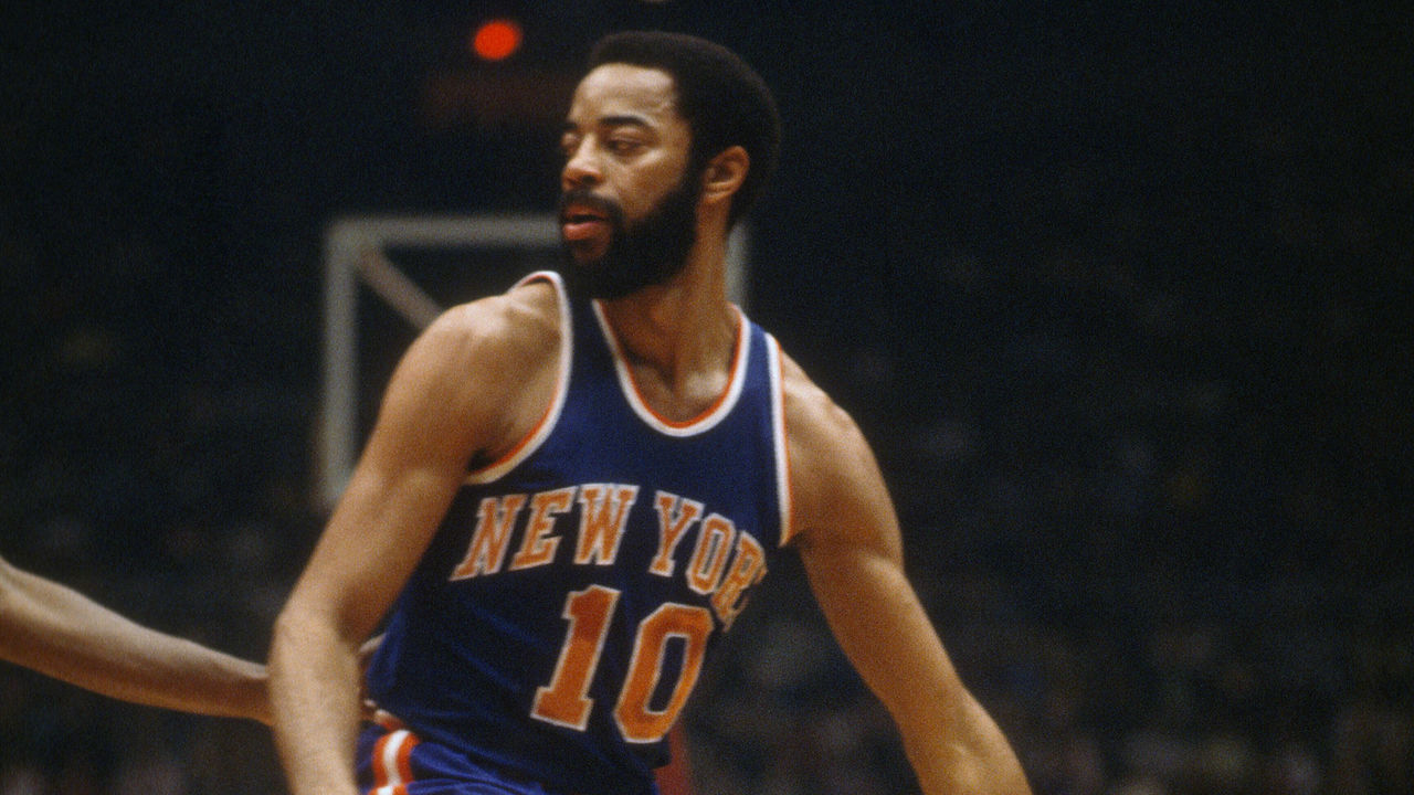 BALTIMORE, MD - CIRCA 1971: Walt Frazier #10 of the New York Knicks dribbles the ball against the Baltimore Bullets during an NBA basketball game circa 1971 at the Baltimore Civic Center in Baltimore, Maryland. Frazier played for the Knicks from 1967-77.