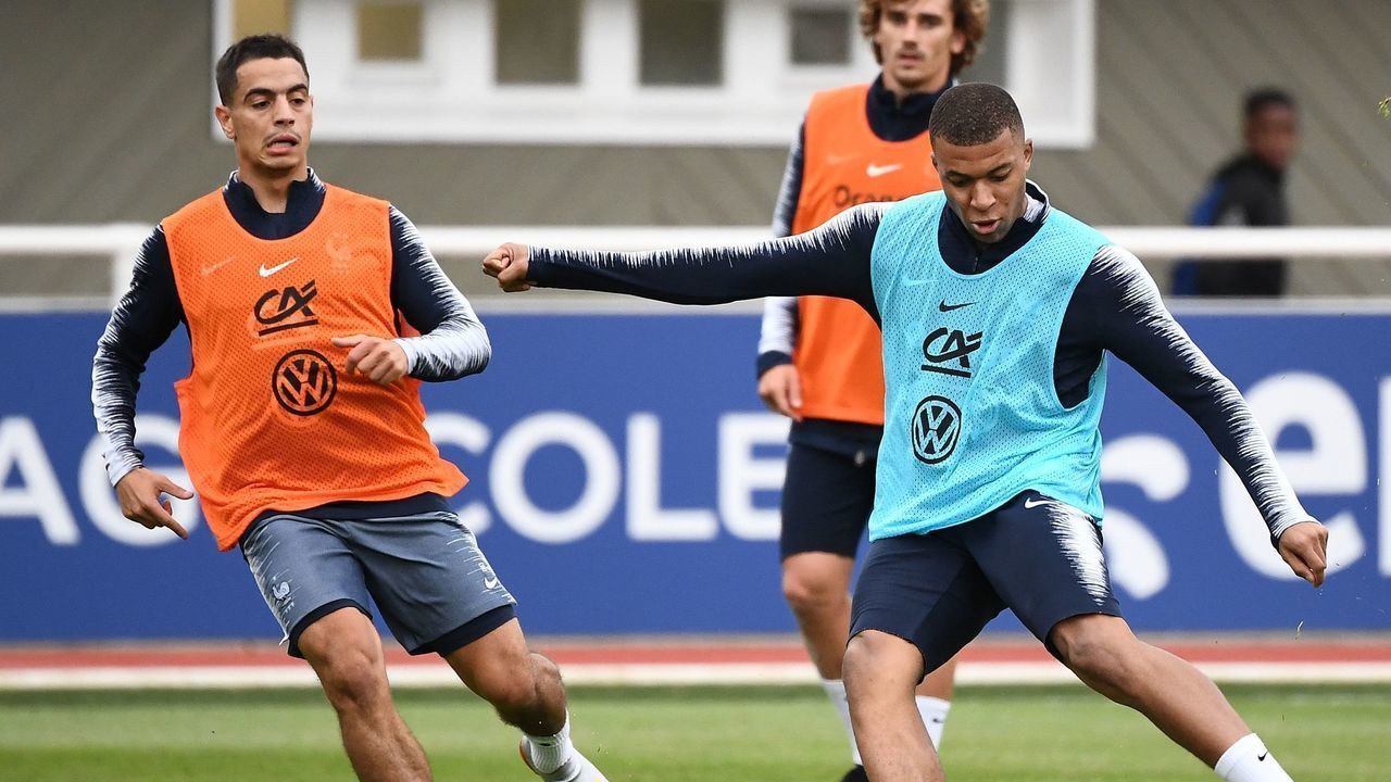 France's forward Wissam Ben Yedder (L) vies with France's forward Kylian Mbappe during a traning session in Clairefontaine-en-Yvelines on May 30, 2019 as part of the team's preparation for the UEFA Euro 2020 qualifying Group H matches against Turkey and Andorra.
