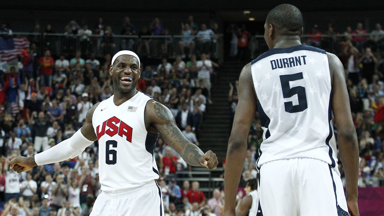 LONDON, ENGLAND - AUGUST 12: LeBron James #6 and Kevin Durant #5 of the United States Men's National Team celebrate after the game against the Spain Men's National Team during the Men's Basketball Gold Medal Match of the London 2012 Olympic Games on August 12, 2012 at North Greenwich Arena Arena in London, England. NOTE TO USER: User expressly acknowledges and agrees that, by downloading and/or using this photograph, user is consenting to the terms and conditions of the Getty Images License Agreement. Mandatory Copyright Notice: Copyright 2012 NBAE