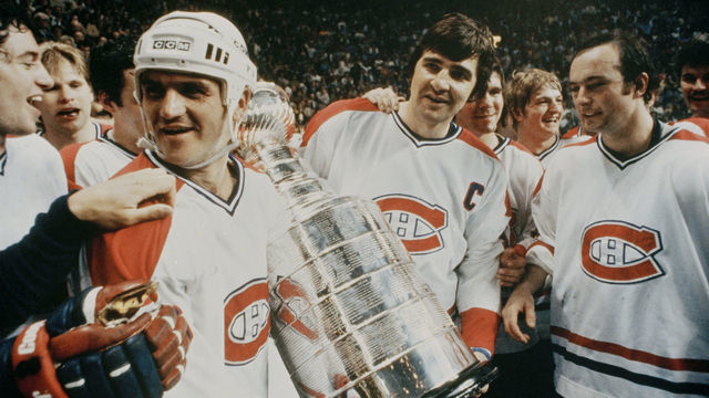 NEW YORK, NY - MAY 21: Jacques Lemaire #25, Serge Savard #18 and Steve Shutt #22 of the Montreal Canadiens celebrate on the ice with the Stanley Cup after defeating the New York Rangers in Game 5 of the Stanley Cup Final at Madison Square Garden on May 21, 1979 in New York City.