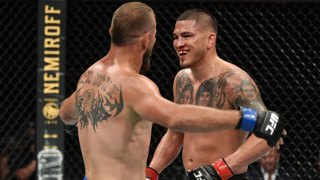 JACKSONVILLE, FLORIDA - MAY 09: (L-R) Donald Cerrone and Anthony Pettis talk after round two in their welterweight fight during the UFC 249 event at VyStar Veterans Memorial Arena on May 09, 2020 in Jacksonville, Florida.