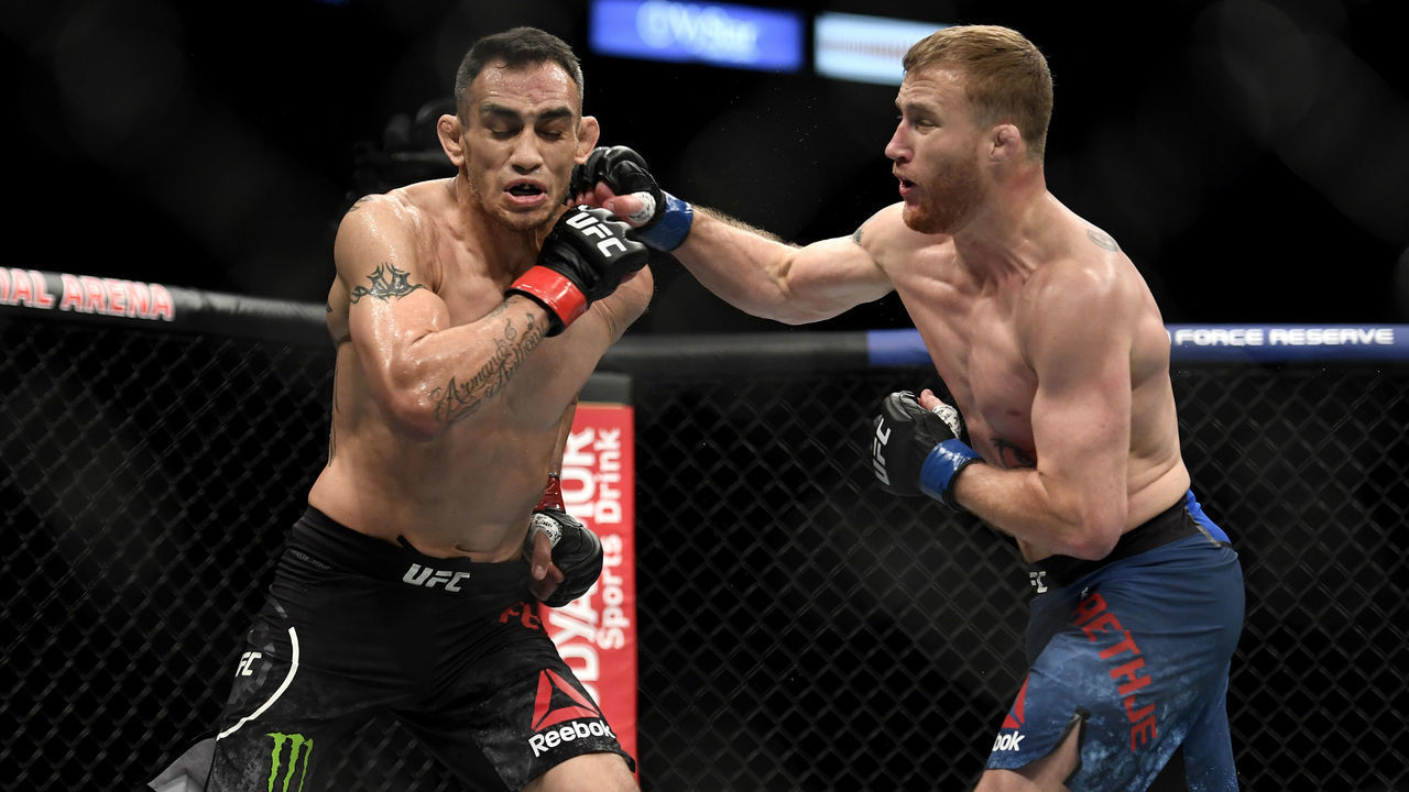 JACKSONVILLE, FLORIDA - MAY 09: Justin Gaethje (R) of the United States punches Tony Ferguson (L) of the United States in their Interim lightweight title fight during UFC 249 at VyStar Veterans Memorial Arena on May 09, 2020 in Jacksonville, Florida.