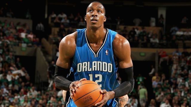BOSTON - MAY 22: Dwight Howard #12 of the Orlando Magic shoots a free throw in Game Three of the Eastern Conference Finals against the Boston Celtics during the 2010 NBA Playoffs on May 22, 2010 at TD Banknorth Garden in Boston, Massachusetts. The Celtics won 94-71. NOTE TO USER: User expressly acknowledges and agrees that, by downloading and/or using this Photograph, user is consenting to the terms and conditions of the Getty Images License Agreement. Mandatory Copyright Notice: Copyright 2010 NBAE