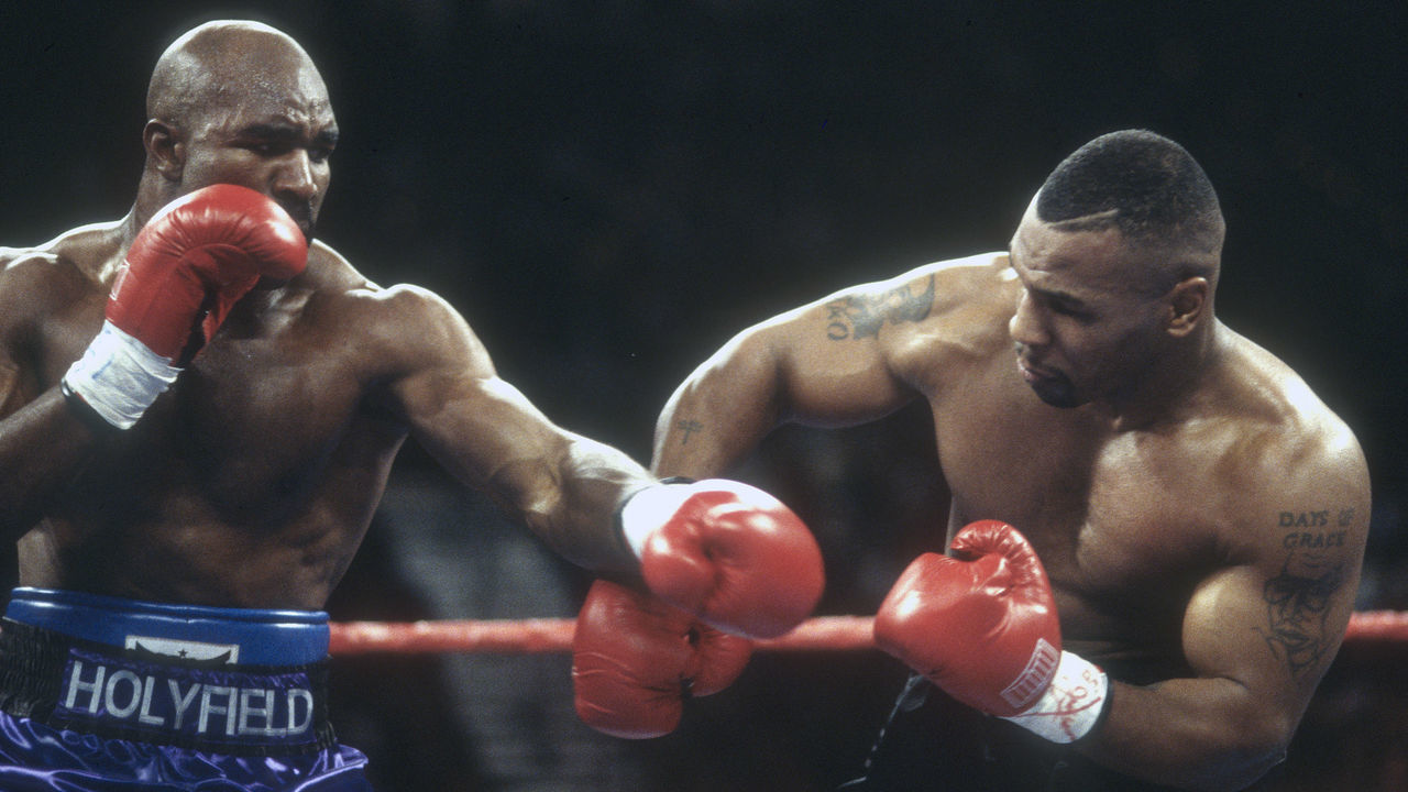 LAS VEGAS, NV - NOVEMBER 9: Evander Holyfield and Mike Tyson fight for the WBA Heavyweight tittle at the MGM Grand Garden on November 9, 1996 in Las Vegas, Nevada. Holyfield won the fight with a TKO in the 11th round.