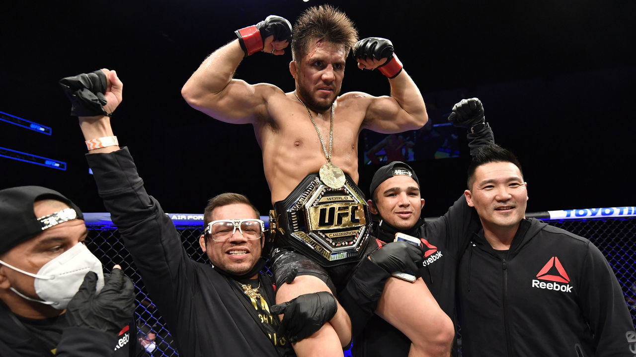 JACKSONVILLE, FLORIDA - MAY 09: Henry Cejudo celebrates after his victory over Dominick Cruz in their UFC bantamweight championship fight during the UFC 249 event at VyStar Veterans Memorial Arena on May 09, 2020 in Jacksonville, Florida.