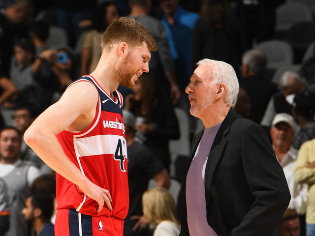 DENVER, CO - OCTOBER 26: Davis Bertans #42 of the Washington Wizards smiles with Head Coach Gregg Popovich of the Washington Wizards after a game against the San Antonio Spurs on October 26, 2019 at the Pepsi Center in Denver, Colorado. NOTE TO USER: User expressly acknowledges and agrees that, by downloading and/or using this Photograph, user is consenting to the terms and conditions of the Getty Images License Agreement. Mandatory Copyright Notice: Copyright 2019 NBAE