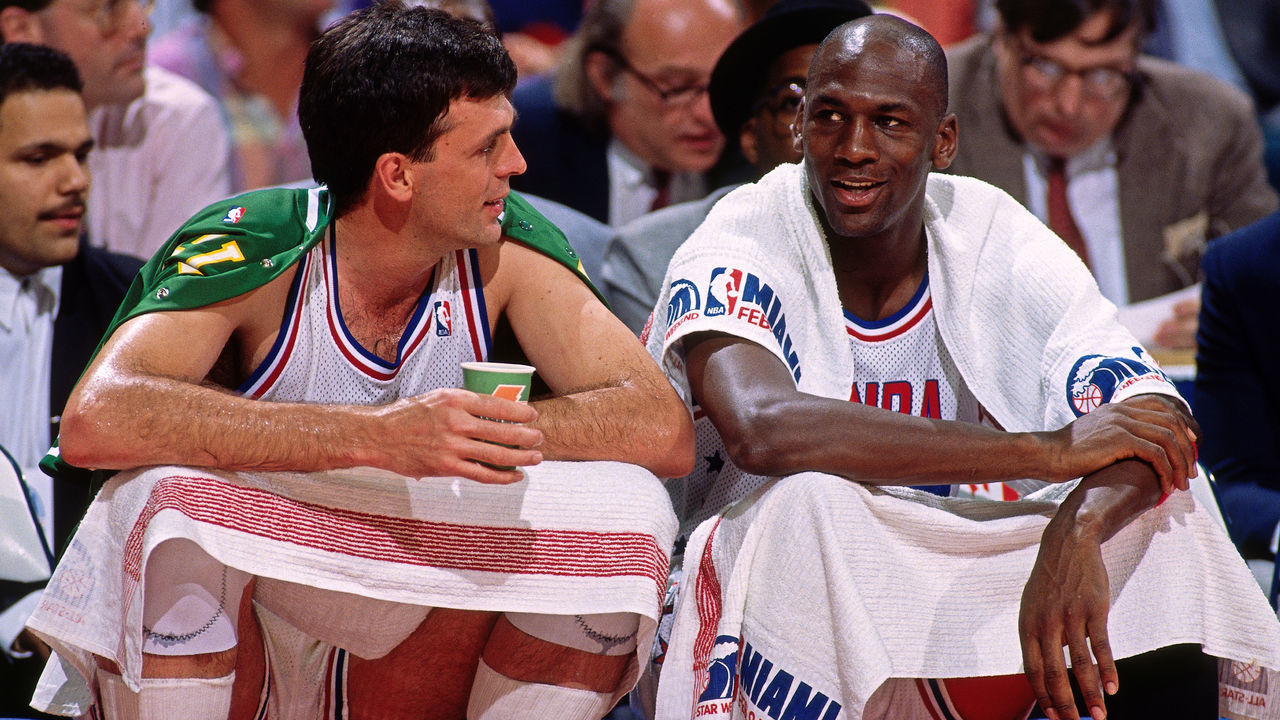 MIAMI, FL- FEBRUARY 11: Kevin McHale #32 and Michael Jordan #23 of the Eastern Conference All Stars talk while sitting on the bench during the 1990 NBA All Star Game on February 11, 1990 in Miami, Florida at the Miami Arena. NOTE TO USER: User expressly acknowledges and agrees that, by downloading and/or using this Photograph, user is consenting to the terms and conditions of the Getty Images License Agreement. Mandatory Copyright Notice: Copyright 1990 NBAE