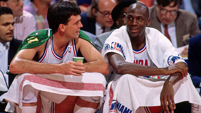 MIAMI, FL- FEBRUARY 11: Kevin McHale #32 and Michael Jordan #23 of the Eastern Conference All Stars talk while sitting on the bench during the 1990 NBA All Star Game on February 11, 1990 in Miami, Florida at the Miami Arena. NOTE TO USER: User expressly acknowledges and agrees that, by downloading and/or using this Photograph, user is consenting to the terms and conditions of the Getty Images License Agreement. Mandatory Copyright Notice: Copyright 1990 NBAE