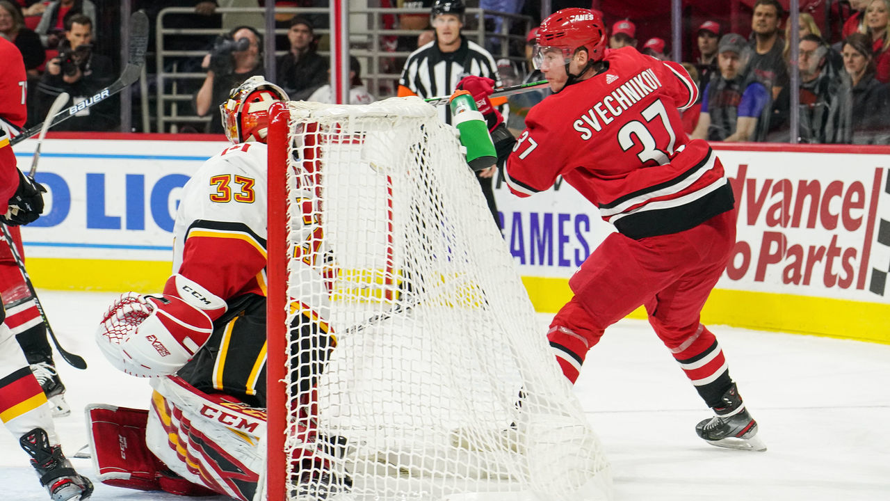 RALEIGH, NC - OCTOBER 29: Carolina Hurricanes Left Wing Andrei Svechnikov (37) scores a lacrosse style goal during a game between the Calgary Flames and the Carolina Hurricanes at the PNC Arena in Raleigh, NC on October 29, 2019.