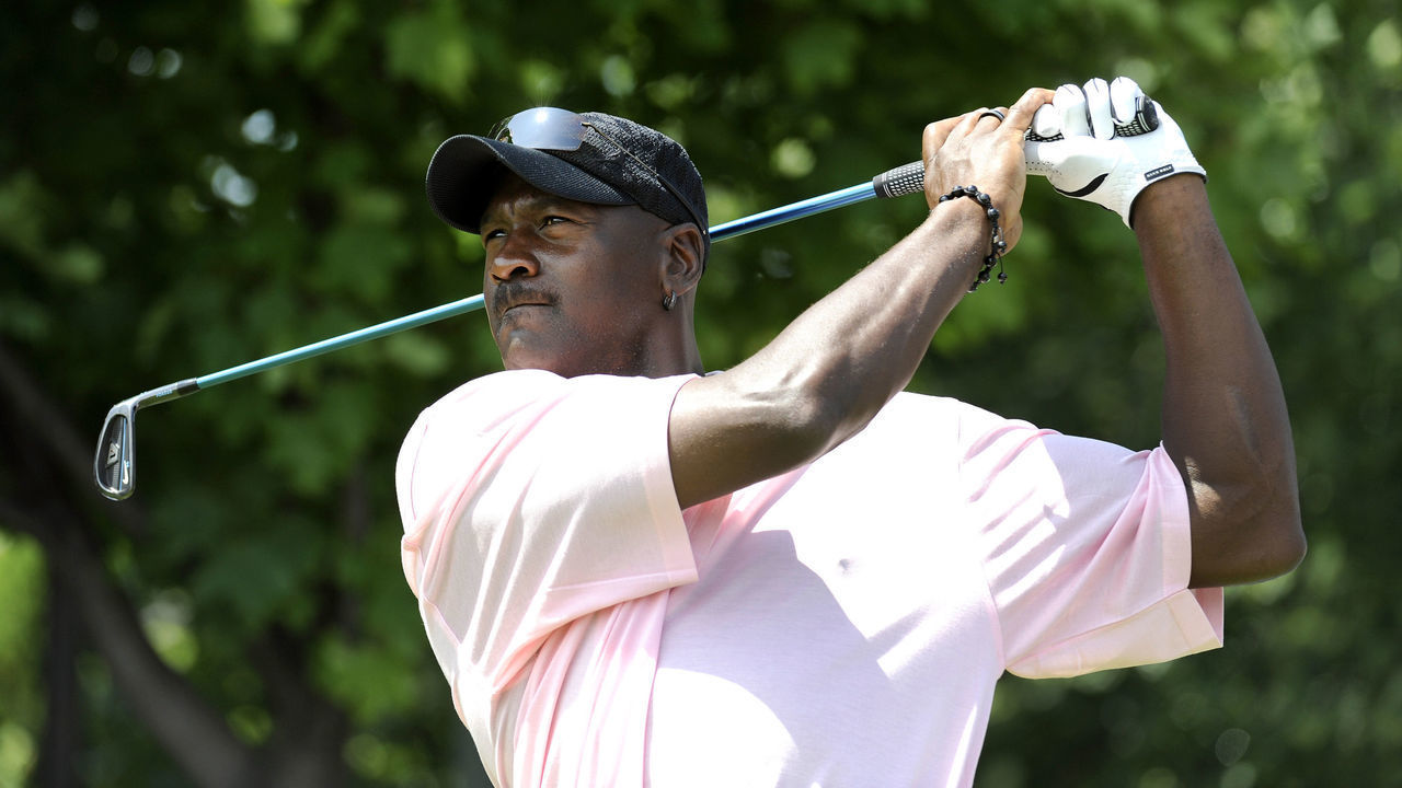 OAKVILLE, ONTARIO, CANADA - JULY 20: Five-time NBA MVP Michael Jordan hits to the seventh green during the RBC Canadian Open's Mike Weir Charity Classic Pro-Am at Glen Abbey Golf Club on July 20, 2009 in Oakville, Ontario, Canada.